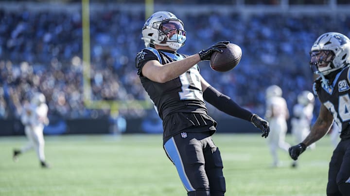 Dec 22, 2024; Charlotte, North Carolina, USA; Carolina Panthers wide receiver Adam Thielen (19) reacts to his touchdown catch against the Arizona Cardinals during the second quarter at Bank of America Stadium. Mandatory Credit: Jim Dedmon-Imagn Images Dec 22, 2024; Charlotte, North Carolina, USA; Carolina Panthers wide receiver Adam Thielen (19) reacts to his touchdown catch against the Arizona Cardinals during the second quarter at Bank of America Stadium. Mandatory Credit: Jim Dedmon-Imagn Images