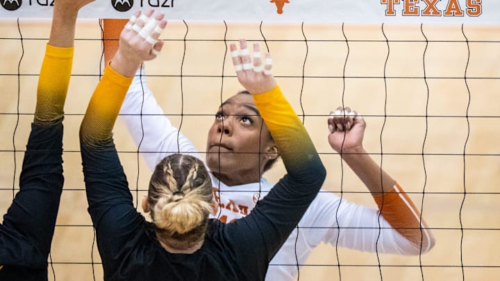 Texas Longhorns middle blocker Marianna Singletary (11) reacts as the ball goes over the net during the Longhorns' match-up with the Missouri Tigers at the Gregory Gym in Austin, Nov. 1, 2024.