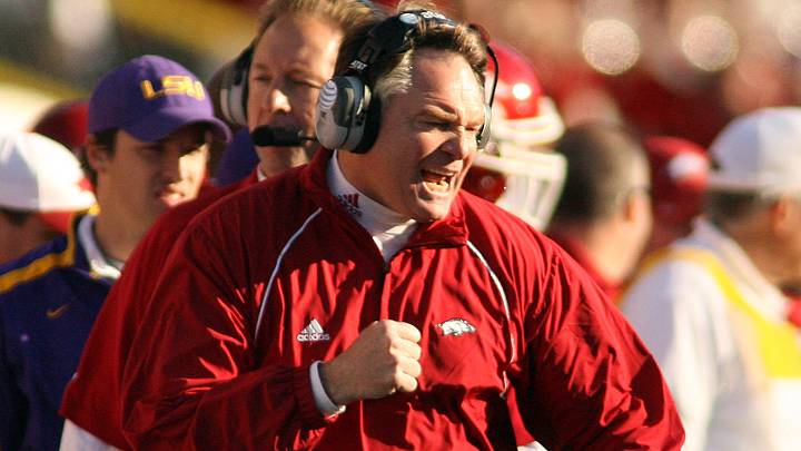 Former Arkansas Razorbacks coach Houston Nutt calls to his players from the sidelines against the LSU Tigers during the first half at Tiger Stadium. Former Arkansas Razorbacks coach Houston Nutt calls to his players from the sidelines against the LSU Tigers during the first half at Tiger Stadium.