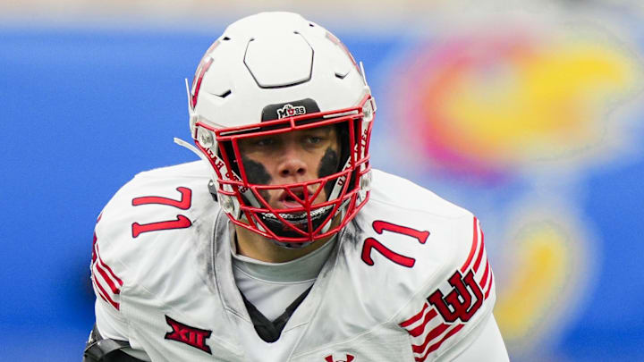 Caleb Lomu gets set before the play