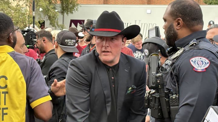 ESPN's Pat McAfee arrives on the set of College GameDay in Norman on Saturday.