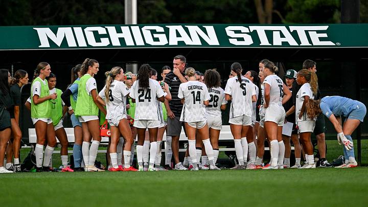 Michigan State’s head coach Jeff Hosler, center, talks with the team during the first half in the game against Loyola on Wednesday, Aug. 19, 2026, at DeMartin Stadium in East Lansing. Michigan State’s head coach Jeff Hosler, center, talks with the team during the first half in the game against Loyola on Wednesday, Aug. 19, 2026, at DeMartin Stadium in East Lansing.