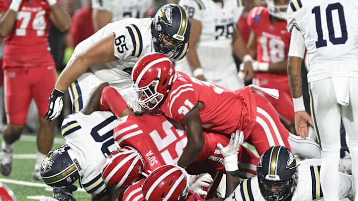 A sea of Monarchs and Braves during a 2022 game at Santa Ana Stadium, where Mater Dei prevailed 17-7