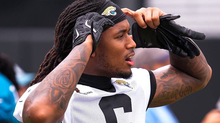 Jaguars safety Antonio Johnson (6) asks a teammate for headphones after the Jaguars held their fourth OTA of the year, Monday June 1, 2026 at the Miller Electric Center in Jacksonville, Fla. [Doug Engle/Florida Times-Union]