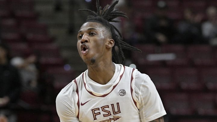 Feb 4, 2025; Tallahassee, Florida, USA; Florida State Seminoles forward Jamir Watkins (1) reacts after hitting a three point basket during the second half against the Notre Dame Fighting Irish at Donald L. Tucker Center. Mandatory Credit: Melina Myers-Imagn Images