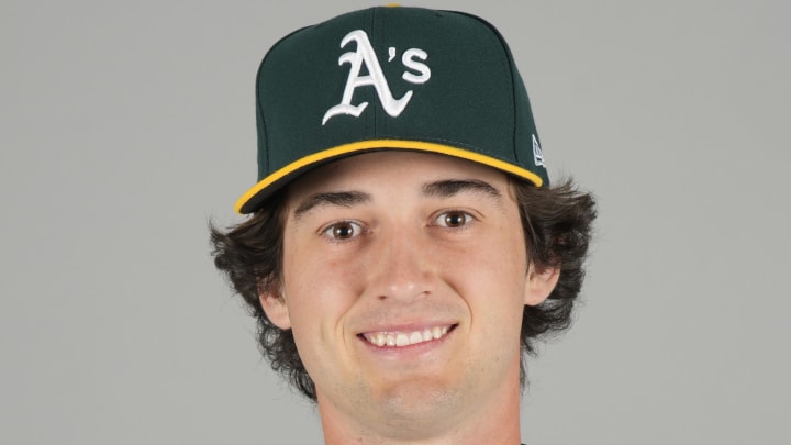 Feb 23, 2024; Mesa, AZ, USA; Oakland Athletics infielder Jacob Wilson (83) poses during Photo Day at Mesa Stadium. Mandatory Credit: Rick Scuteri-USA TODAY Sports