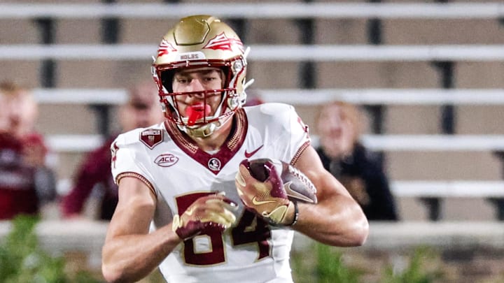 Oct 18, 2024; Durham, North Carolina, USA; Florida State Seminoles tight end Kyle Morlock (84) runs with the football during the first half of the game against Duke Blue Devils at Wallace Wade Stadium. Mandatory Credit: Jaylynn Nash-Imagn Images