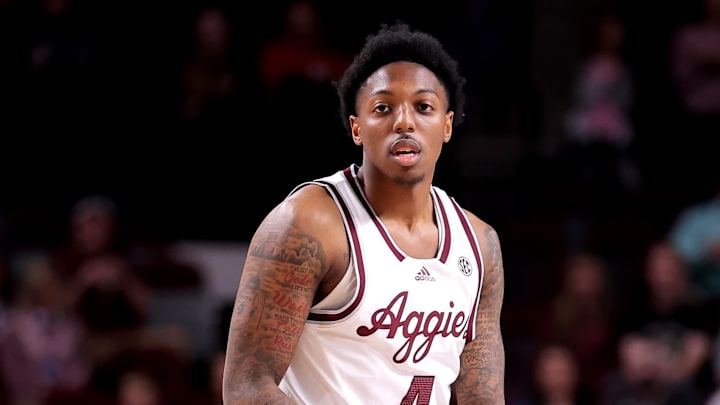 Dec 30, 2023; College Station, Texas, USA; Texas A&M Aggies guard Wade Taylor IV (4) handles the
