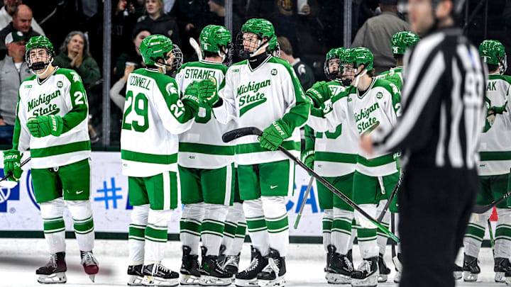 Michigan State celebrates their win over Notre Dame on Thursday, Feb. 19, 2026, at the Munn Ice Arena in East Lansing.
