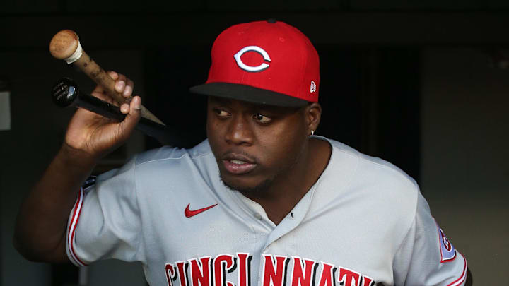 Cincinnati Reds left fielder Aristides Aquino (44) takes the field.