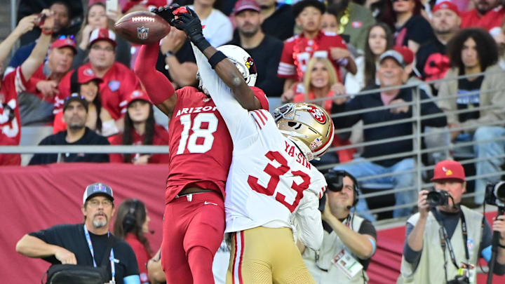 San Francisco 49ers CB Rock Ya-Sin (33) breaks up a pass intended for Cardinals wide receiver Marvin Harrison Jr. (18) 