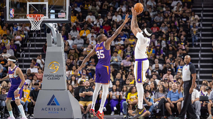 Oct 6, 2024; Palm Desert, California, USA; Los Angeles Lakers forward Anthony Davis (3) shoots over Phoenix Suns forward Kevin Durant (35) during the first half at Acrisure Arena. Mandatory Credit: David Frerker-Imagn Images