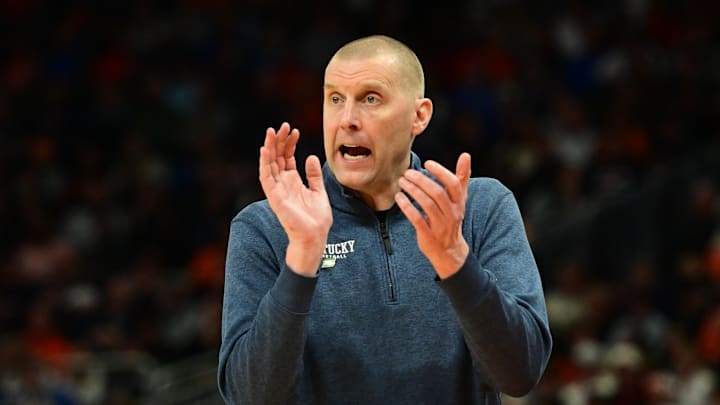Mar 23, 2025; Milwaukee, WI, USA; Kentucky Wildcats head coach Mark Pope reacts during the second half in the second round of the NCAA Tournament against the Illinois Fighting Illini at Fiserv Forum. Mandatory Credit: Benny Sieu-Imagn Images Mar 23, 2025; Milwaukee, WI, USA; Kentucky Wildcats head coach Mark Pope reacts during the second half in the second round of the NCAA Tournament against the Illinois Fighting Illini at Fiserv Forum. Mandatory Credit: Benny Sieu-Imagn Images