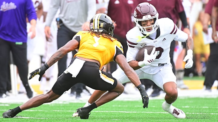 Mississippi State Bulldogs wide receiver Brenen Thompson (0) runs the ball against Southern Miss Golden Eagles cornerback Josh Moten (1) during the second quarter.