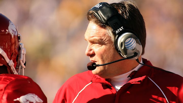 Former Arkansas Razorbacks coach Houston Nutt watches his team take on the LSU Tigers during the first half at Tiger Stadium. Mandatory Credit: 
