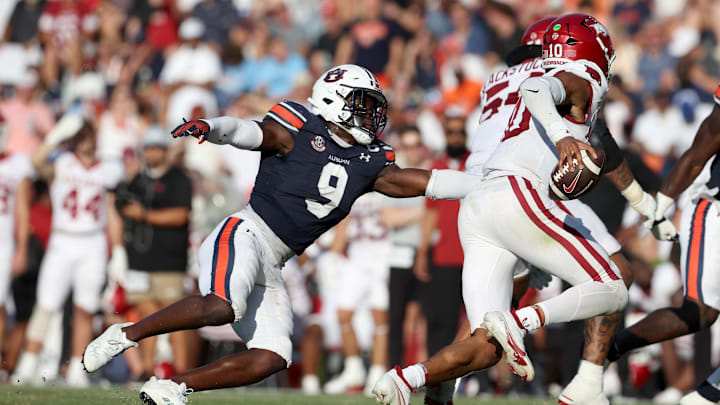 Sep 21, 2024; Auburn, Alabama, USA;  Auburn Tigers linebacker Eugene Asante (9) chases Arkansas Razorbacks quarterback Taylen Green (10) during the fourth quarter at Jordan-Hare Stadium. Mandatory Credit: John Reed-Imagn Images