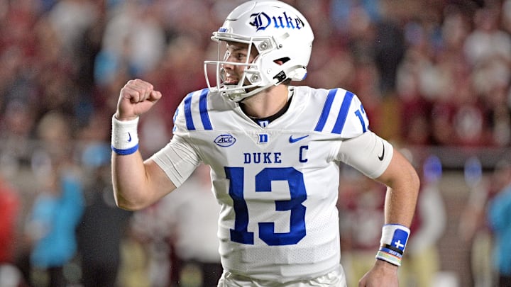 Duke Blue Devils quarterback Riley Leonard (13) celebrates
