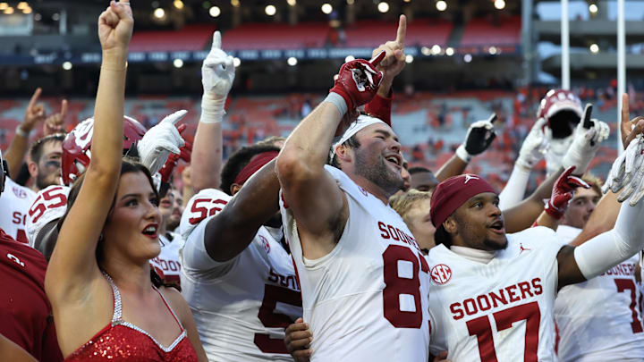 Oklahoma's Damonic Williams (52), Jake Roberts (87) and Jaquaize Pettaway (17) celebrate the Auburn win. Oklahoma's Damonic Williams (52), Jake Roberts (87) and Jaquaize Pettaway (17) celebrate the Auburn win.