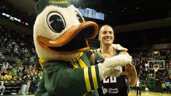 The Oregon Duck and Sabrina Ionescu make an “O” together after the New York Liberty defeated the Toyota Antelopes in a exhibition game at Matthew Knight Arena.