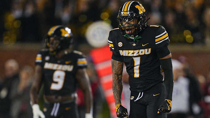 Nov 9, 2024; Columbia, Missouri, USA; Missouri Tigers safety Marvin Burks Jr. (1) celebrates after a fumble recovery during the second half against the Oklahoma Sooners at Faurot Field at Memorial Stadium. Mandatory Credit: Jay Biggerstaff-Imagn Images