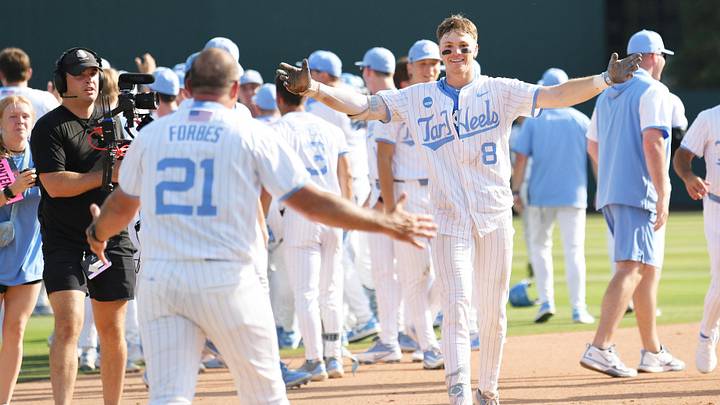 June 7, 2026; Chapel Hill, NC, USA; North Carolina Tar Heels outfielder Owen Hull (8) celebrates with head coach Scott Forbes after his game winning hit against the USC Trojans at Boshamer Stadium. Mandatory Credit: Zachary Taft-Imagn Images June 7, 2026; Chapel Hill, NC, USA; North Carolina Tar Heels outfielder Owen Hull (8) celebrates with head coach Scott Forbes after his game winning hit against the USC Trojans at Boshamer Stadium. Mandatory Credit: Zachary Taft-Imagn Images