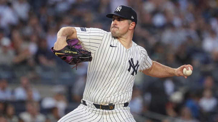 Jun 5, 2024; Bronx, New York, USA; New York Yankees starting pitcher Carlos Rodon (55) delivers a pitch during the fourth inning against the Minnesota Twins at Yankee Stadium. 
