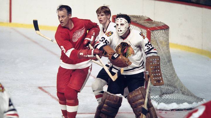 1970; Detroit, MI, USA; FILE PHOTO; Chicago Blackhawks goalie Tony Esposito (35) and defender Keith Magnuson (3) in action against Detroit Red Wings right wing Gordie Howe (9) during the 1970 season. Mandatory Credit: Tony Tomsic-USA TODAY NETWORK