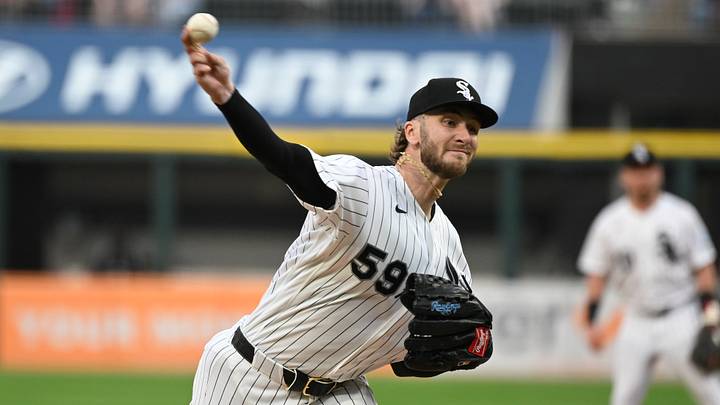 Aug 26, 2026; Chicago, Illinois, USA;  Chicago White Sox pitcher Sean Burke (59) delivers the ball during the first inning against the Texas Rangers at Rate Field.  Mandatory Credit: Matt Marton-Imagn Images