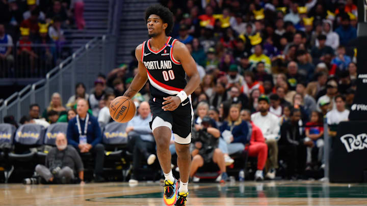 Oct 11, 2024; Seattle, Washington, USA; Portland Trail Blazers guard Scoot Henderson (00) dribbles the ball during the second half at Climate Pledge Arena. Mandatory Credit: Steven Bisig-Imagn Images
