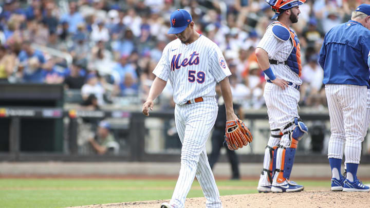 Sep 4, 2022; New York City, New York, USA;  New York Mets pitcher Carlos Carrasco (59) walks off the