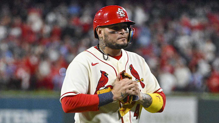 Oct 8, 2022; St. Louis, Missouri, USA; St. Louis Cardinals catcher Yadier Molina (4) walks off the field after hitting a single for his final postseason at bat in the ninth inning against the Philadelphia Phillies during game two of the Wild Card series for the 2022 MLB Playoffs at Busch Stadium. Mandatory Credit: Jeff Curry-Imagn Images Oct 8, 2022; St. Louis, Missouri, USA; St. Louis Cardinals catcher Yadier Molina (4) walks off the field after hitting a single for his final postseason at bat in the ninth inning against the Philadelphia Phillies during game two of the Wild Card series for the 2022 MLB Playoffs at Busch Stadium. Mandatory Credit: Jeff Curry-Imagn Images