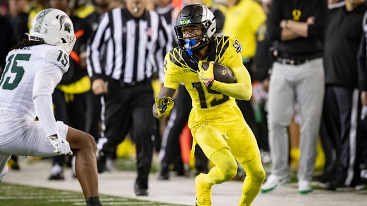 Oregon Ducks wide receiver Tez Johnson carries the ball up the sideline as the Ducks host the Spartans Friday, Oct. 4, 2024 at Autzen Stadium in Eugene, Ore. Oregon Ducks wide receiver Tez Johnson carries the ball up the sideline as the Ducks host the Spartans Friday, Oct. 4, 2024 at Autzen Stadium in Eugene, Ore.
