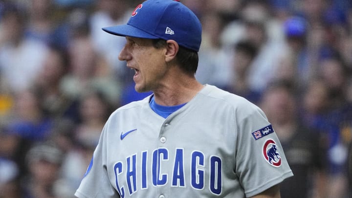 Jul 29, 2025; Milwaukee, Wisconsin, USA; Chicago Cubs manager Craig Counsell (11) disputes a call with umpire DJ Reyburn (17) (not pictured) against the Milwaukee Brewers in the fourth inning at American Family Field.