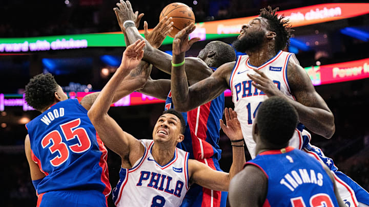 Oct 15, 2019; Philadelphia, PA, USA; Philadelphia 76ers guard Zhaire Smith (8) and forward Norvel Pelle (14) and Detroit Pistons forward Christian Wood (35) and forward Thon Maker (7) compete for a loose ball during the fourth quarter at Wells Fargo Center. Mandatory Credit: Bill Streicher-Imagn Images