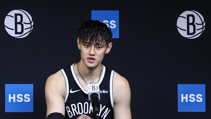 Sep 23, 2025; Brooklyn, NY, USA;  Brooklyn Nets forward Zeng Fanbo (12) speaks at Media Day. Mandatory Credit: Wendell Cruz-Imagn Images