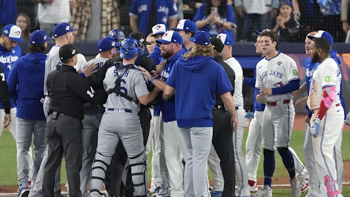 Nov 1, 2025; Toronto, Ontario, CAN; The benches clear in the fourth inning between the Toronto Blue Jays and the Los Angeles Dodgers during game seven of the 2025 MLB World Series at Rogers Centre. Mandatory Credit: Kevin Sousa-Imagn Images