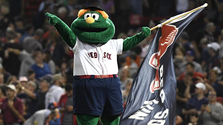 Sep 15, 2018; Boston, MA, USA; Boston Red Sox mascot Wally celebrates after defeating the New York Mets at Fenway Park. Mandatory Credit: Bob DeChiara-Imagn Images