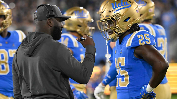 Sep 28, 2024; Pasadena, California, USA; UCLA Bruins head coach DeShaun Foster talks to Oregon Ducks at the Rose Bowl. Mandatory Credit: Robert Hanashiro-Imagn Images