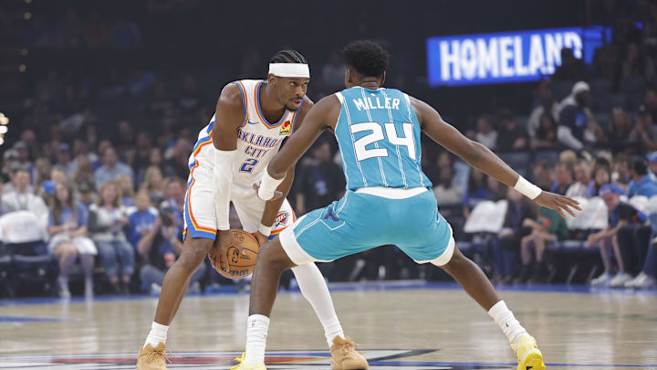Oct 9, 2025; Oklahoma City, Oklahoma, USA; Oklahoma City Thunder guard Shai Gilgeous-Alexander (2) is defended by Charlotte Hornets forward Brandon Miller (24) during the 1st quarter of a game between the Charlotte Hornets and the Oklahoma City Thunder at Paycom Center. Mandatory Credit: Alonzo Adams-Imagn Images