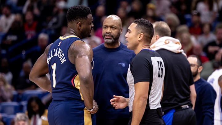 New Orleans Pelicans forward Zion Williamson (1) complains to referee John Conley (56) and Orlando Magic head coach Jamahl Mosley about a play during the second half at Smoothie King Center. New Orleans Pelicans forward Zion Williamson (1) complains to referee John Conley (56) and Orlando Magic head coach Jamahl Mosley about a play during the second half at Smoothie King Center.