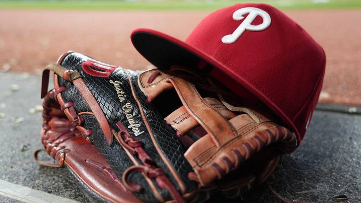 Jun 8, 2026; Toronto, Ontario, CAN; The glove and hat of Philadelphia Phillies center fielder Justin Crawford (2) in the dugout during a game against the Toronto Blue Jays at Rogers Centre. Jun 8, 2026; Toronto, Ontario, CAN; The glove and hat of Philadelphia Phillies center fielder Justin Crawford (2) in the dugout during a game against the Toronto Blue Jays at Rogers Centre.