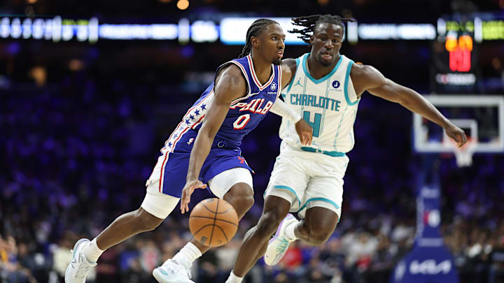 Oct 25, 2025; Philadelphia, Pennsylvania, USA; Philadelphia 76ers guard Tyrese Maxey (0) dribbles the ball past Charlotte Hornets guard Sion James (4) during the second quarter at Xfinity Mobile Arena. Mandatory Credit: Bill Streicher-Imagn Images Oct 25, 2025; Philadelphia, Pennsylvania, USA; Philadelphia 76ers guard Tyrese Maxey (0) dribbles the ball past Charlotte Hornets guard Sion James (4) during the second quarter at Xfinity Mobile Arena. Mandatory Credit: Bill Streicher-Imagn Images