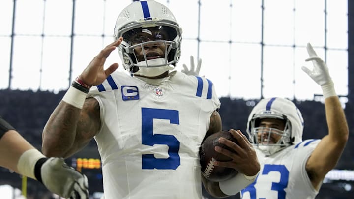 Dec 22, 2024; Indianapolis, Indiana, USA; Indianapolis Colts quarterback Anthony Richardson (5) celebrates after rushing for a touchdown during a game against the Tennessee Titans at Lucas Oil Stadium. Mandatory Credit: Christine Tannous/USA Today Network via Imagn Images 