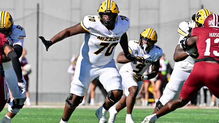 Oct 12, 2024; Amherst, Massachusetts, USA; Missouri Tigers offensive lineman Cayden Green (70) in action during the second half against the Massachusetts Minutemen at Warren McGuirk Alumni Stadium. Mandatory Credit: Eric Canha-Imagn Images Oct 12, 2024; Amherst, Massachusetts, USA; Missouri Tigers offensive lineman Cayden Green (70) in action during the second half against the Massachusetts Minutemen at Warren McGuirk Alumni Stadium. Mandatory Credit: Eric Canha-Imagn Images