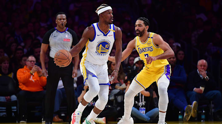Apr 3, 2025; Los Angeles, California, USA; Golden State Warriors forward Jimmy Butler III (10) controls the ball against Los Angeles Lakers guard Gabe Vincent (7) during the first half at Crypto.com Arena. Mandatory Credit: Gary A. Vasquez-Imagn Images Apr 3, 2025; Los Angeles, California, USA; Golden State Warriors forward Jimmy Butler III (10) controls the ball against Los Angeles Lakers guard Gabe Vincent (7) during the first half at Crypto.com Arena. Mandatory Credit: Gary A. Vasquez-Imagn Images
