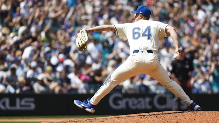 Jun 15, 2025; Seattle, Washington, USA; Seattle Mariners pitcher Casey Legumina (64) throws against the Cleveland Guardians during the seventh inning at T-Mobile Park. Mandatory Credit: Joe Nicholson-Imagn Images