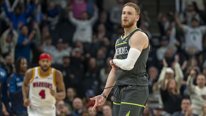 Minnesota Timberwolves guard Donte DiVincenzo celebrates after making a 3-pointer against the Golden State Warriors at Target Center in Minneapolis on Jan. 15, 2025.
