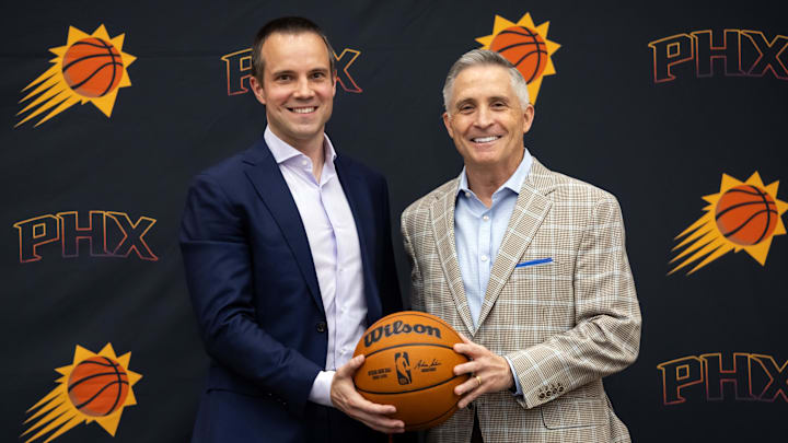 Jun 10, 2025; Scottsdale, AZ, USA; Phoenix Suns head coach Jordan Ott (left) poses for a photo with general manager Brian Gregory during an introductory press conference at the Verizon 5g Performance Center. Mandatory Credit: Mark J. Rebilas-Imagn Images