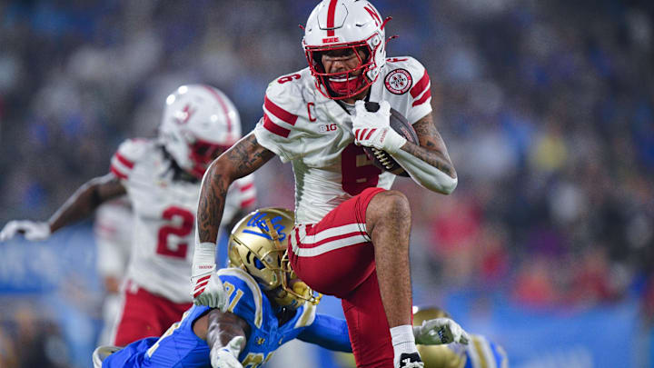 Dane Key carries the ball against the UCLA Bruins.