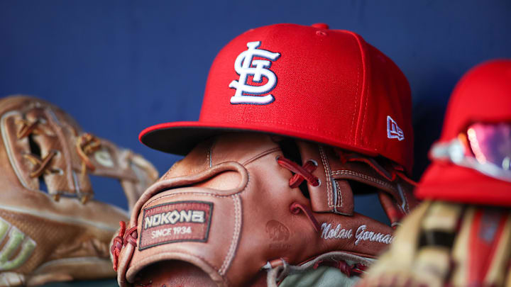 Sep 5, 2023; Atlanta, Georgia, USA; A detailed view of the hat and glove of St. Louis Cardinals second baseman Nolan Gorman (not pictured) before a game against the Atlanta Braves at Truist Park. Mandatory Credit: Brett Davis-Imagn Images